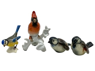 SET OF FOUR PORCELAIN BIRD FIGURINES