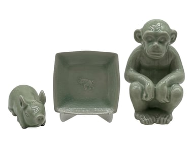 THREE CELADON GLAZED PORCELAIN FIGURINES