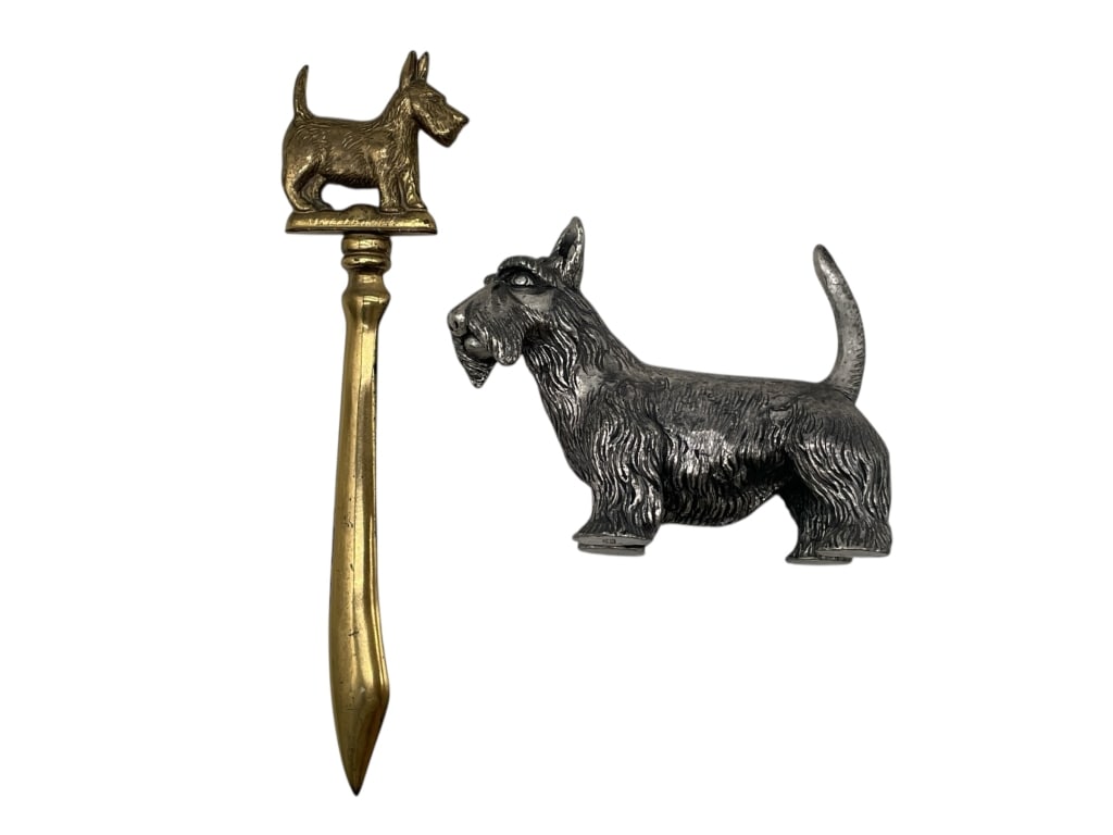 SCOTTIE DOG LETTER OPENER AND FIGURINE PAIR: SCOTTIE DOG LETTER OPENER AND FIGURINE PAIR -Very good pre owned condition -Letter opener approx 7"l, figurine approx 3"h x 4"w -The letter opener is a fine example of classic deskware. The handle is