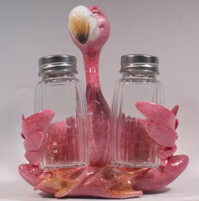 NEW! FLAMINGO SALT AND PEPPER SHAKERS: From the house of Sea Creations, explore our charming Salt & Pepper Flamingo Figurines. Measuring at 6", these figurines are a delightful addition to any home decor collection. They carry a large pres
