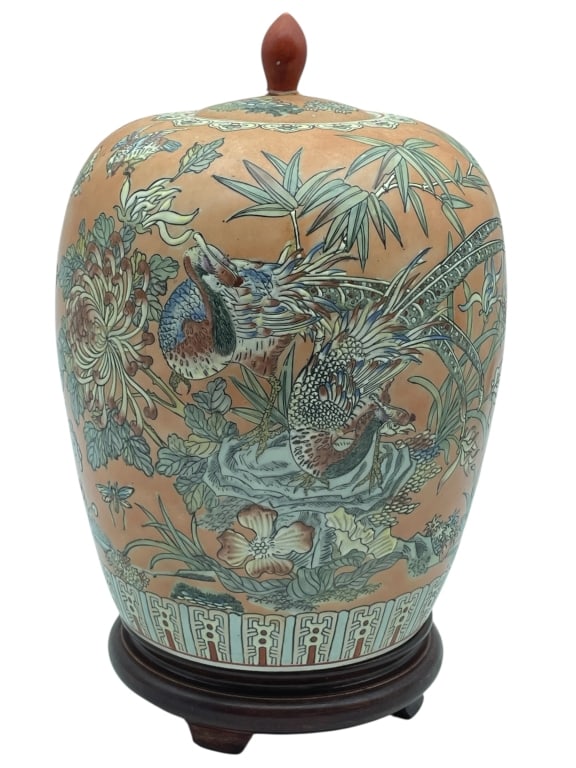 SATSUMA STYLE LIDDED VASE ON WOOD BASE 15": SATSUMA STYLE LIDDED VASE ON WOOD BASE 15" -Good pre owned condition, repaired finial (see photos) -Approx 15"h x 8"w -Decorative lidded jar, adorned with an intricate design of phoenix birds among ch