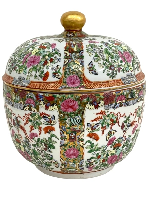 FAMILLE ROSE MEDALLION STYLE COVERED JAR 13": FAMILLE ROSE MEDALLION STYLE COVERED JAR WITH FLORAL AND BIRD MOTIFS, GOLD FINIAL, AND DECORATIVE ENAMELING THROUGHOUT. VIBRANTLY HAND-PAINTED WITH PEONIES, BUTTERFLIES, AND PHOENIX BIRDS IN PANELS OF
