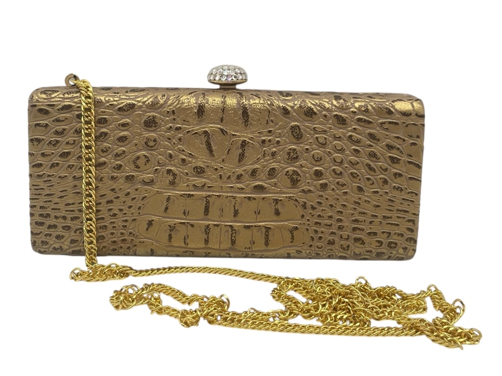VINTAGE GOLD CROCODILE-STYLE EVENING CLUTCH: VINTAGE GOLD CROCODILE-STYLE EVENING CLUTCH WITH RHINESTONE CLASP & CHAIN STRAP -Good pre owned condition, chain strap is detatched on one side -Approx 7"l x 3"h -Elegant vintage evening clutch in a s