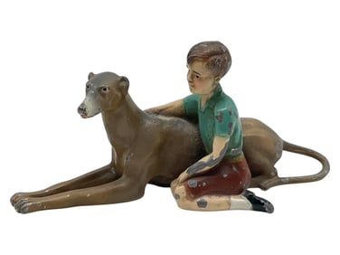 VINTAGE CAST IRON BOY W/ DOG FIGURINE 6"