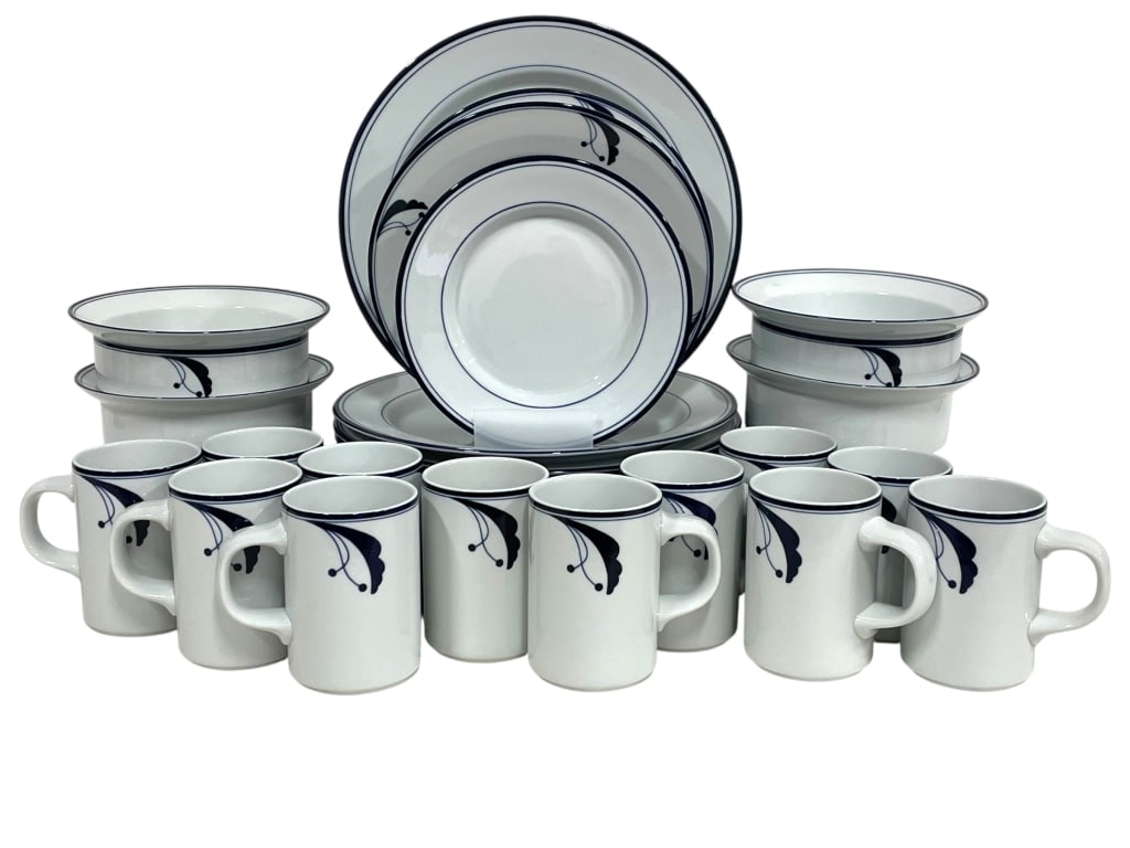 29 PC DANSK FLORA PORCELAIN DINNERWARE SET: DANSK FLORA PORCELAIN DINNERWARE SET WITH BLUE BOTANICAL DESIGN - ELEGANT WHITE PORCELAIN DINNERWARE SET INCLUDES 10 DINNER PLATES, 3 SALAD PLATES, 4 DEEP BOWLS, AND 12 MUGS, ALL FEATURING A DELICATE