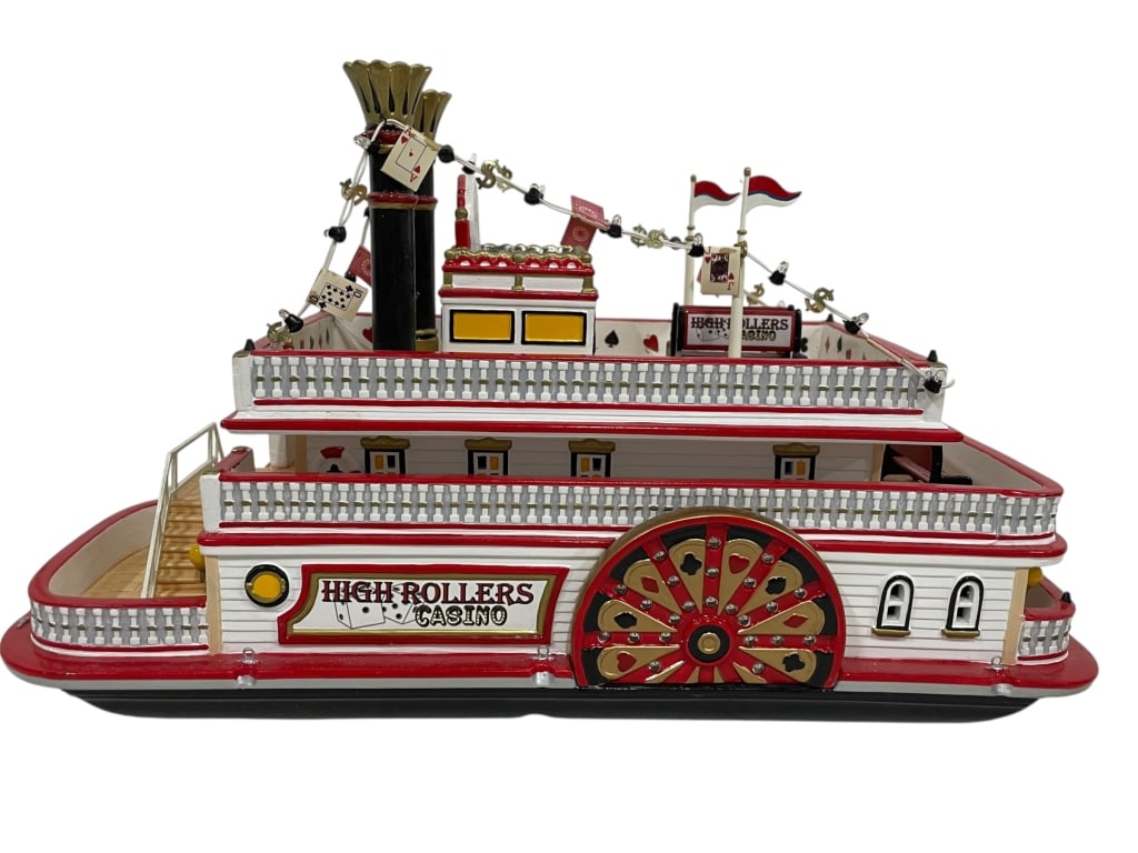 DEPT. 56 HIGH ROLLERS RIVERBOAT CASINO CHRISTMAS: DEPARTMENT 56 THE ORIGINAL SNOW VILLAGE “HIGH ROLLERS RIVERBOAT CASINO” LIGHTED BUILDING WITH ADAPTER. THIS HIGHLY DETAILED, COLORFUL CERAMIC PIECE FROM 2008 FEATURES A BRIGHT RED AND WHITE PA