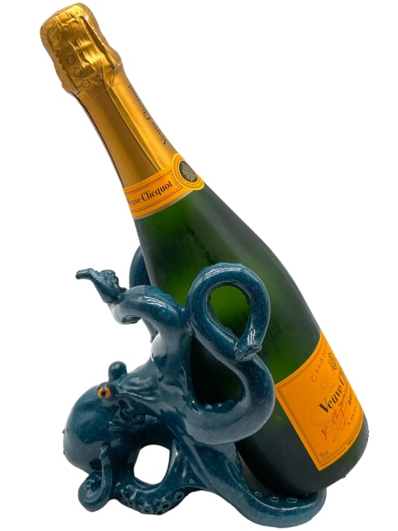 JAY STRONGWATER STYLE OCTOPUS WINE HOLDER: JAY STRONGWATER STYLE OCTOPUS WINE HOLDER Discover the charm of marine life with our Octopus Wine Holder from Sea Creations. This 7.5" Octopus adds a touch of the sea to your home decor. It's an ideal