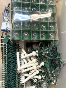 BIN OF HOLIDAY LIGHTS AND ORNAMENTS