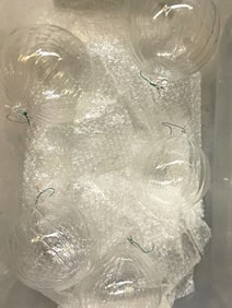 BIN OF LARGE CLEAR HOLIDAY ORNAMENTS