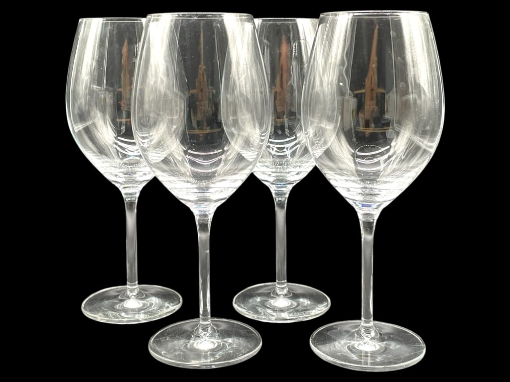 4 SCHOTT ZWIESEL CRU CLASSIC WINE GLASSES: 4 SCHOTT ZWIESEL CRU CLASSIC WINE GLASSES -VERY GOOD PRE OWNED CONDITION -APPROX 8" X 2.25" -SET OF 4 GLASSES -CLASSIC BALLOON BOWL DESIGN WITH TALL STEMS AND ELEGANTLY TAPERED RIMS, SUITABLE FOR BORD
