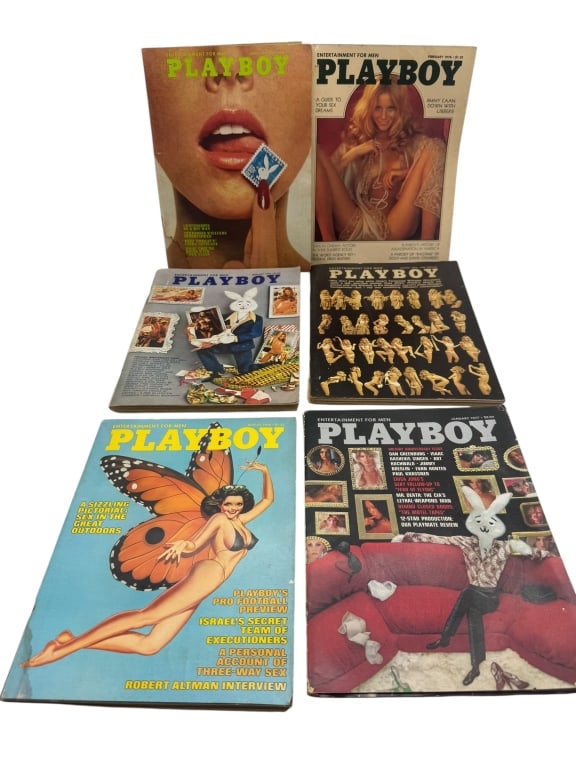 SIX VINTAGE PLAYBOY MAGAZINES FROM THE 1970'S: LOT OF SIX VINTAGE PLAYBOY MAGAZINES FROM THE 1970s. THIS COLLECTION INCLUDES ICONIC COVERS SUCH AS THE BUTTERFLY COSTUME COVER (AUGUST 1972), THE CLOSE-UP “BLUE STAMP” LIPS COVER, AND OTHERS