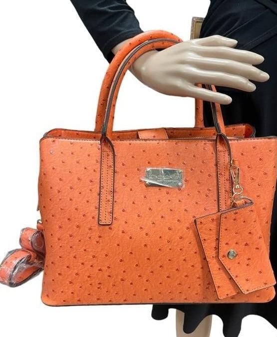 BEBE DOME ORANGE SATCHEL HANDBAG: BEBE DOME ORANGE SATCHEL HANDBAG - COLOR ORANGE - OSTRICH TEXTURE - ADJUSTABLE ARM STRAP - ITEM GOOD CONDITION By bidding on