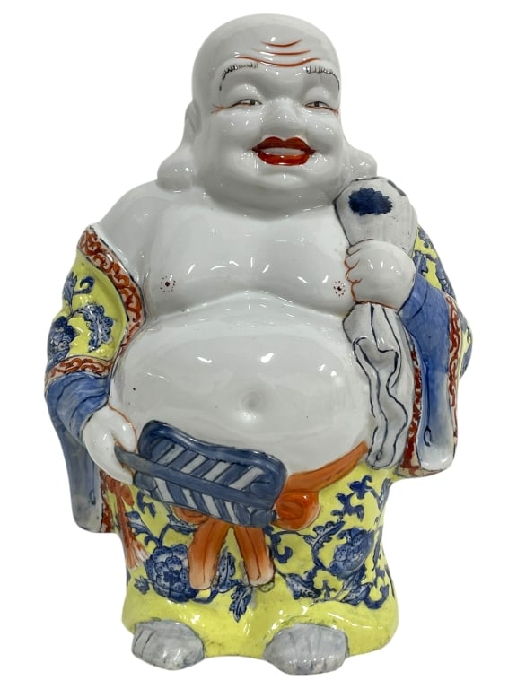 PORCELAIN HAPPY BUDDHA FIGURINE 11": PORCELAIN HAPPY BUDDHA FIGURINE 11" -Very good pre owned condition -Approx 7"l x 7"w x 11"h -Decorated in rich enamel tones of yellow, blue, orange, and red with intricate robe patterns and expressive
