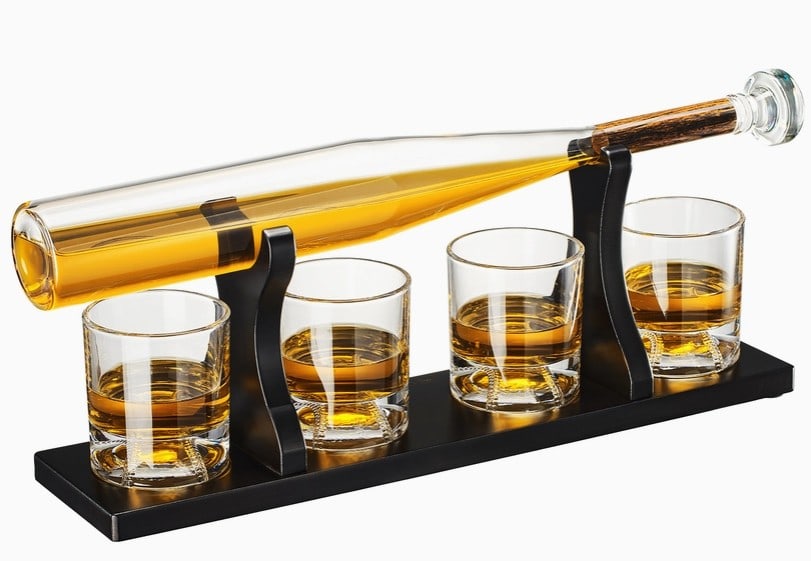 NEW! BASEBALL DECANTER SET: EXCLUSIVE BASEBALL DECANTER SET: This bar accessories for the home bar set features a large baseball decanter and four whiskey glasses in a unique mahogany bat-shaped holder, perfect for any baseball 