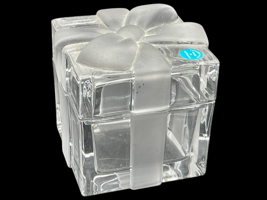 TIFFANY & CO. CRYSTAL JEWELRY BOX 3": TIFFANY & CO. CRYSTAL JEWELRY BOX 3" -Very good pre owned condition -Approx 3"h x 3"w x 3"d -Tiffany & Co. crystal gift box with frosted ribbon and bow design. This iconic piece is crafted from heavy 