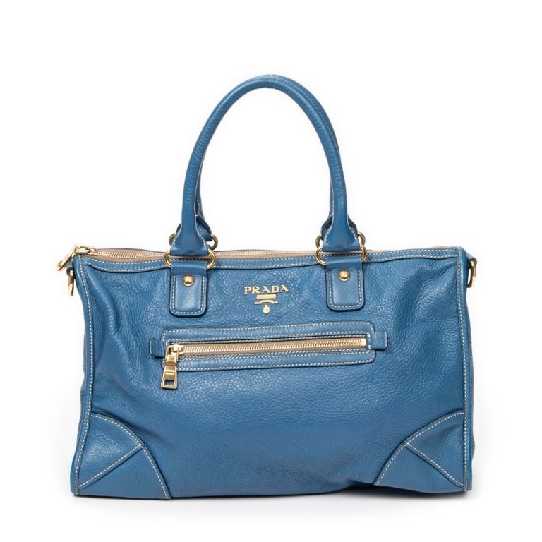 PRADA 2-WAY ZIP TOTE VITELLO DAINO LEATHER: Prada 2-Way Zip Tote Vitello Daino Leather * COLOR: Blue * PRODUCTION CODE: 204 * INCLUDED: Strap 37.5*23*15cm * CONDITION: A * (3cm = 1inch approximately) * Luxury bags are kept offsite for security,