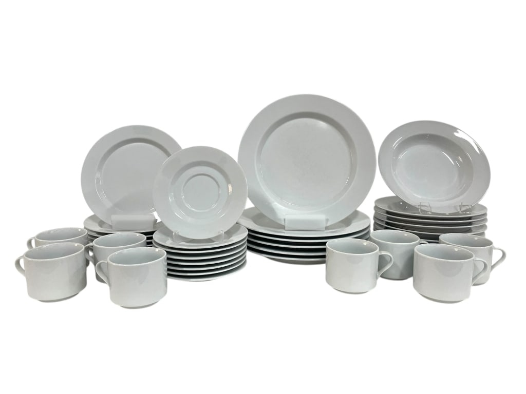 PRELUDE PORCELAIN DINNERWARE SET: PRELUDE PORCELAIN DINNERWARE SET -Very good pre owned condition -Set includes: 8 cups 2.5" x 3" 8 saucers 6" 7 bowls 7" 7 salad plates 8" 6 dinner plates 10" -Elegant white porcelain dinnerware servic