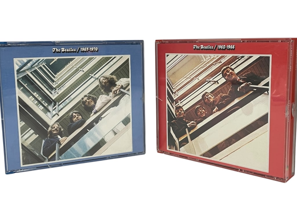 THE BEATLES RED & BLUE ALBUMS 4-CD COMPILATON LOT: THE BEATLES "RED" AND "BLUE" ALBUMS 4-CD COMPILATION LOT: 1962–1970 -An essential two-piece CD set encompassing the entire recording career of The Beatles. This lot includes the iconic double-CD com
