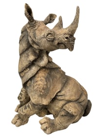 A BREED APART SEATED RHINOCEROS SCULPTURE 11"