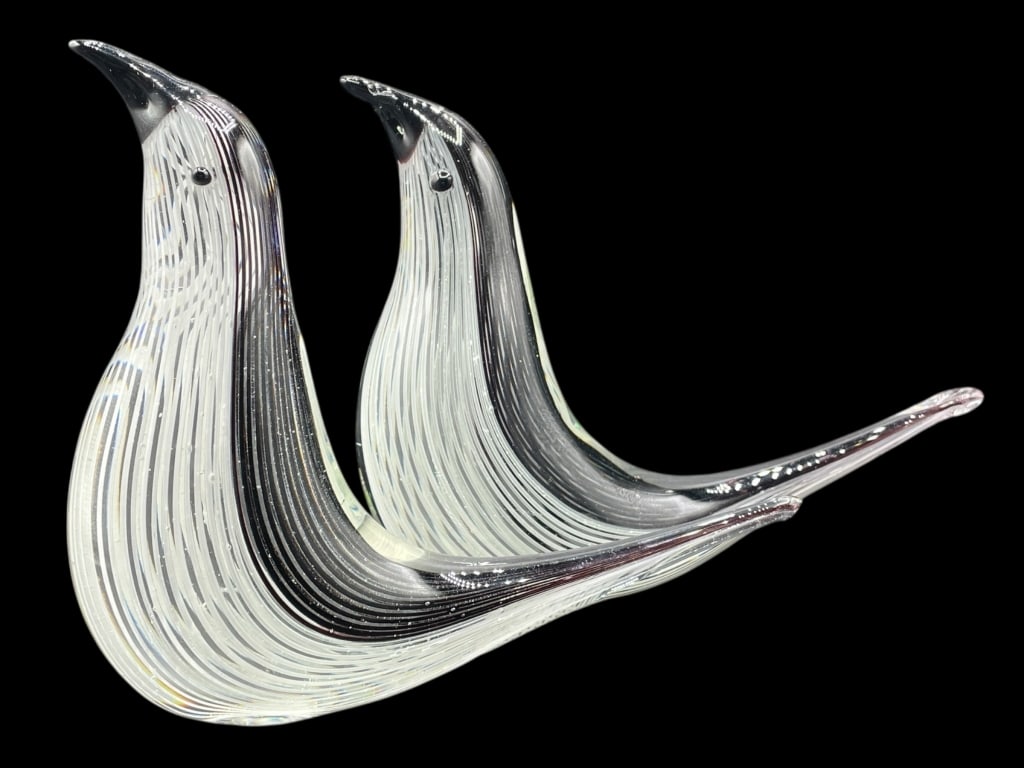 MURANO-STYLE ART GLASS BIRD SCULPTURES 9": MURANO-STYLE ART GLASS BIRD SCULPTURES 9"_x005F -Very good pre owned condition_x005F -Approx 7"h x 9"l_x005F -Pair of exquisite Murano-style art glass bird sculptures featuring sleek, elongated forms 