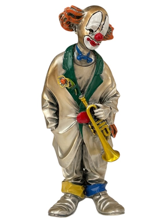 LEONARDO SILVER CLOWN SCULPTURE W TRUMPET 10": LEONARDO SILVER CLOWN SCULPTURE W TRUMPET 10"_x005F -Very good pre owned condition_x005F -Approx 10"h x 4.5"w_x005F -Delightful metallic clown figurine with vibrant enamel accents, featuring a whimsic