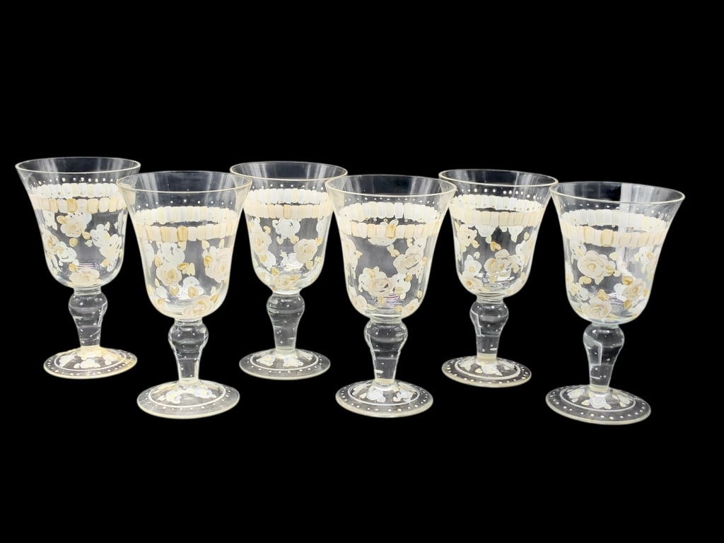 SIX HAND-PAINTED FLORAL GOBLETS 6.5": SIX HAND-PAINTED FLORAL GOBLETS 6.5" -Good pre owned condition, one glass has chip on rim, one glass has been repaired on base (see photos) -Approx 6.5"h x 3.5"w -Delightful set of six clear glass gob