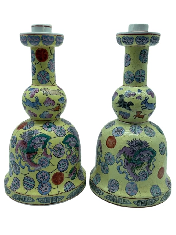 FAMILLE ROSE STYLE PORCELAIN CANDLESTICKS 13": PAIR OF CHINESE EXPORT FAMILLE ROSE STYLE PORCELAIN CANDLESTICKS This is an eye-catching pair of Chinese export porcelain candlesticks, featuring a dramatic tiered form reminiscent of stacked gourds,