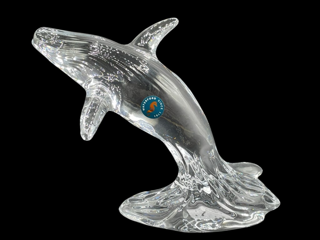 WATERFORD CRYSTAL WHALE SCULPTURE 7": WATERFORD CRYSTAL WHALE SCULPTURE 7" -Very good pre owned condition -Approx 6.5"h x 7"l -Beautifully crafted with exquisite clarity and fluid lines that capture the grace and motion of a leaping whale