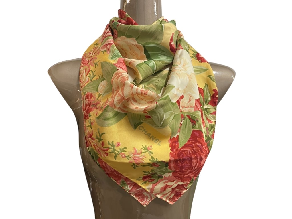 CHANEL YELLOW SILK SCARF W RED & WHITE FLORAL 38": CHANEL YELLOW SILK SCARF WITH RED AND WHITE FLORAL PRINT -Very good pre owned condition -Approx 38" -Vibrant and romantic Chanel silk scarf featuring an allover floral print of red, pink, and white ca