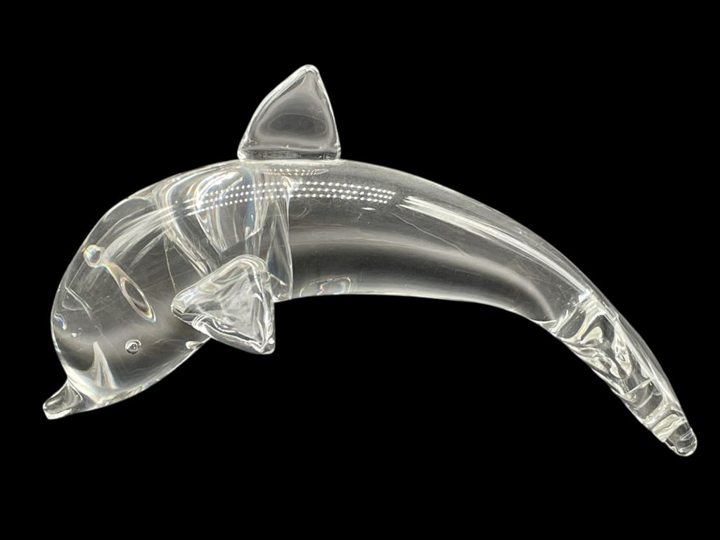 STEUBEN CLEAR ART GLASS DOLPHIN SCULPTURE 9": STEUBEN CLEAR ART GLASS DOLPHIN SCULPTURE 9" -Good pre owned condition, crack near fin (see photos) -Approx 9"l x 3"w x 5"h -Clear art glass dolphin with beautifully sculpted fins and a smooth arched