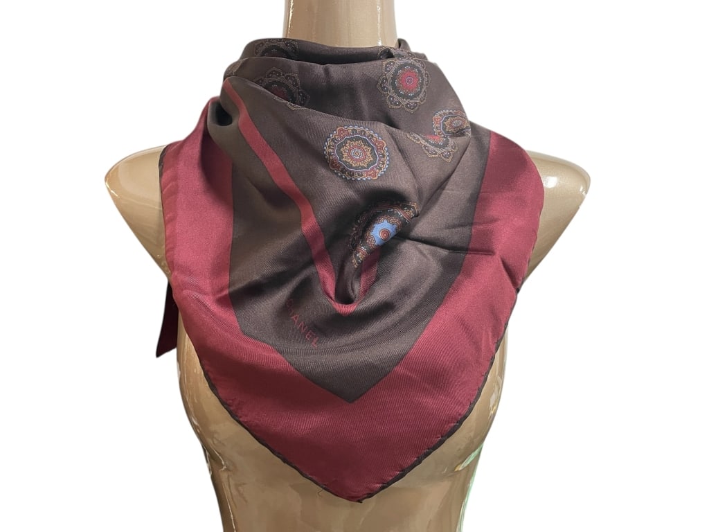 CHANEL BURGUNDY MEDALLION SILK SCARF 33": CHANEL BURGUNDY AND CHARCOAL MEDALLION SILK SCARF -Very good pre owned condition -Approx 33" -Elegant Chanel silk scarf in deep burgundy and charcoal tones, featuring a sophisticated geometric medalli