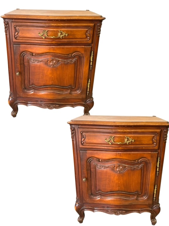 PAIR OF FRENCH LOUIS XV STYLE NIGHTSTANDS: PAIR OF FRENCH LOUIS XV STYLE NIGHTSTANDS OR SIDE CABINETS FEATURING SERPENTINE FRONTS, ORNATELY CARVED PANELS, CABRIOLE LEGS, AND BRONZE FLORAL HARDWARE — A CLASSIC BLEND OF ELEGANCE AND FUNCTIONAL