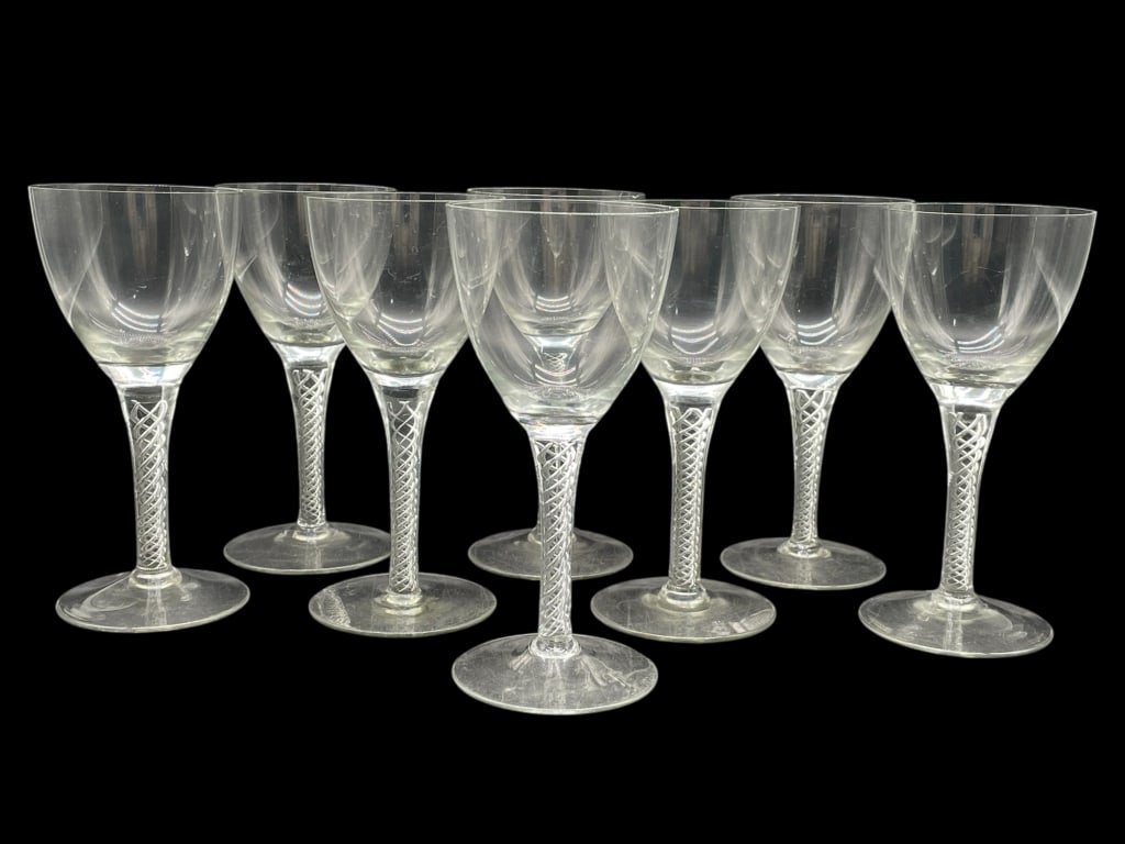 8 AIR TWIST STEM WINE GLASSES 6": 8 AIR TWIST STEM WINE GLASSES 6" -Good pre owned condition, one glass has small chip on rim (see photos) -Approx 6"h x 2.5"w -A highly desirable and collectible glassmaking technique associated with 1