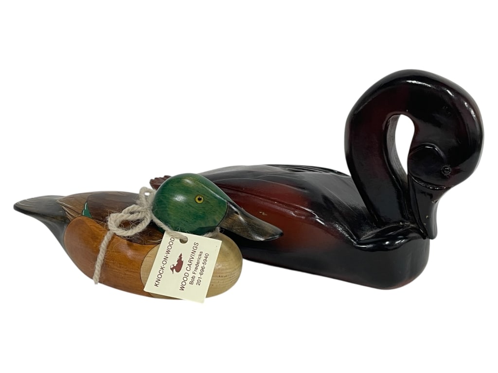 CARVED WOODEN WATERFOWL FIGURINES 11": CARVED WOODEN WATERFOWL FIGURINES 11" -Very good pre owned condition -Approx 9" and 11" long -Charming pair of hand-carved wooden bird sculptures, including a colorful mallard duck by Knock on Wood an