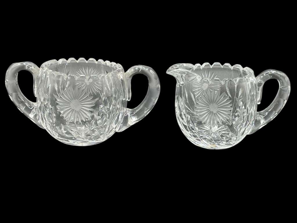 AMERICAN BRILLIANT CUT GLASS CREAMER & SUGAR SET: AMERICAN BRILLIANT CUT GLASS CREAMER AND SUGAR SET -Very good pre owned condition -Approx 3" tall -Stunning American Brilliant Cut Glass creamer and sugar bowl set, featuring an intricate sunburst and