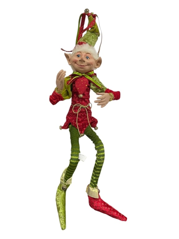 ROBERT STANLEY POSABLE CHRISTMAS ELF FIGURINE 33": ROBERT STANLEY POSABLE CHRISTMAS ELF FIGURINE — RED & GREEN HOLIDAY COSTUME -Very good pre owned condition -Approx 33" long -This charming Robert Stanley posable Christmas elf figurine brings festiv