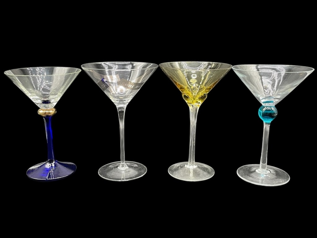SET OF 4 ASSORTED ART GLASS MARTINI GLASSES: SET OF 4 ASSORTED ART GLASS MARTINI GLASSES -Very good pre owned condition -Set of 4 glasses -Beautiful mixed set of four art glass martini glasses, each featuring unique color accents and modern scul