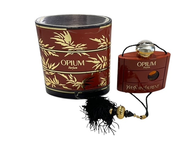 VINTAGE YSL OPIUM PARFUM WITH ORIG BOX 90% FULL: - one of the earlier versions of this amazing scent - 15 ml in size - comes as shown with original box and tassle - still has a great scent just might not last as long By bidding on this listing, you 