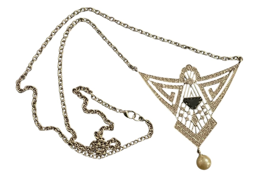 VINTAGE ART DECO CRYSTAL STYLIZED SILVER NECKLACE: - SILVER tone coloration - art deco style pendant attached with thin chain for necklace - 20" long chain - in very good condition By bidding on this listing, you understand and agree to be bound by th
