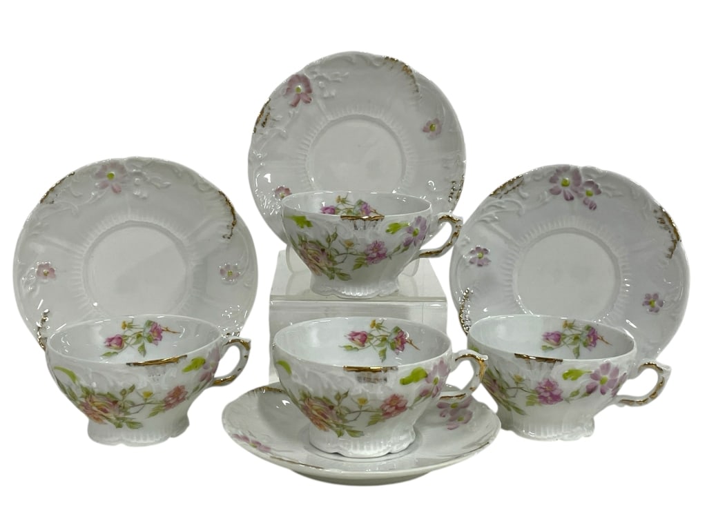 4 WEIMAR GERMANY TEACUPS AND SAUCERS: 4 WEIMAR GERMANY TEACUPS AND SAUCERS -VERY GOOD PRE OWNED CONDITION -SET OF 4 CUPS AND SAUCERS -TEACUPS AND SAUCERS WITH EMBOSSED FLORAL DETAILING AND HAND-PAINTED PINK FLOWER SPRAYS. EACH CUP AND SAU