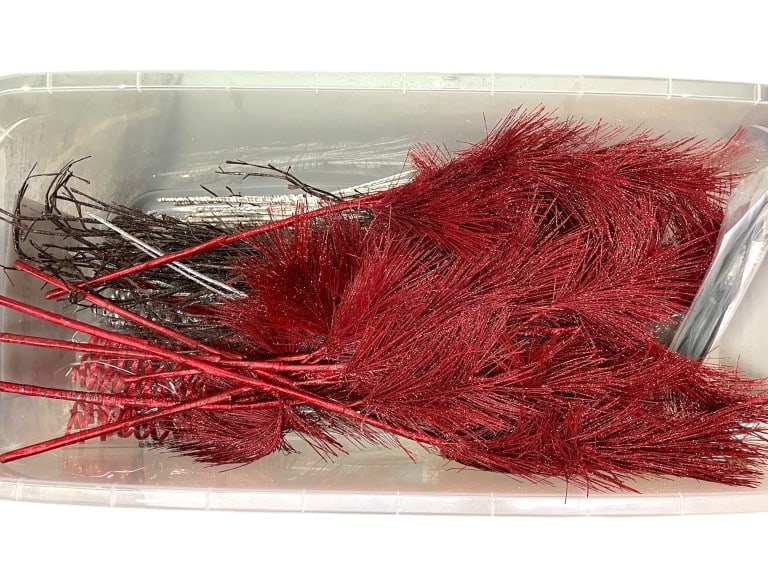 BIN OF DECORATIVE HOLIDAY FLORAL PICKS AND SPRAYS: BIN OF DECORATIVE HOLIDAY FLORAL PICKS AND SPRAYS -GOOD PRE OWNED CONDITION, SEE PHOTOS -INCLUDES RED GLITTERED PINE BRANCHES, METALLIC TWIG SPRAYS, AND ASSORTED FESTIVE STEMS. PERFECT FOR WREATHS, CE
