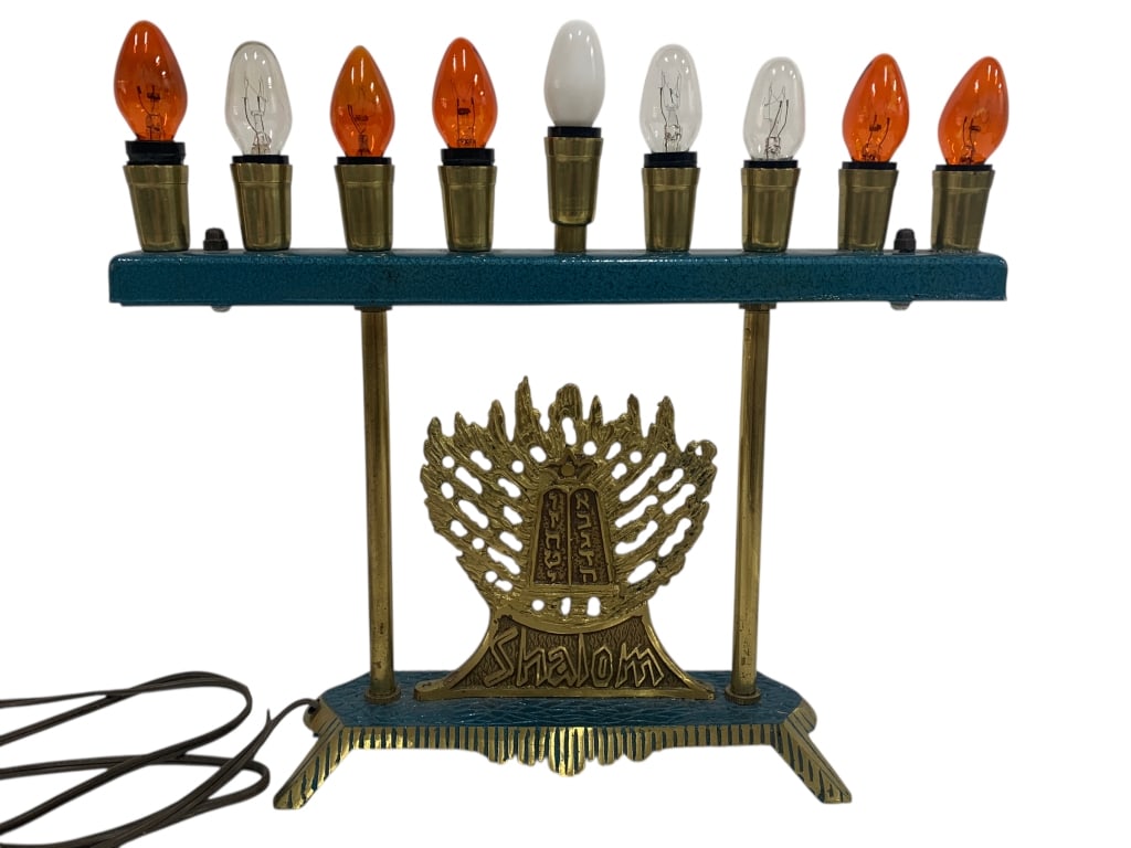 VINTAGE ELECTRIC HANUKKAH MENORAH: VINTAGE ELECTRIC HANUKKAH MENORAH WITH SHALOM BASE -Charming vintage electric Hanukkah menorah featuring a brass-toned “Shalom” base with raised Hebrew lettering and a stylized flame motif. Th