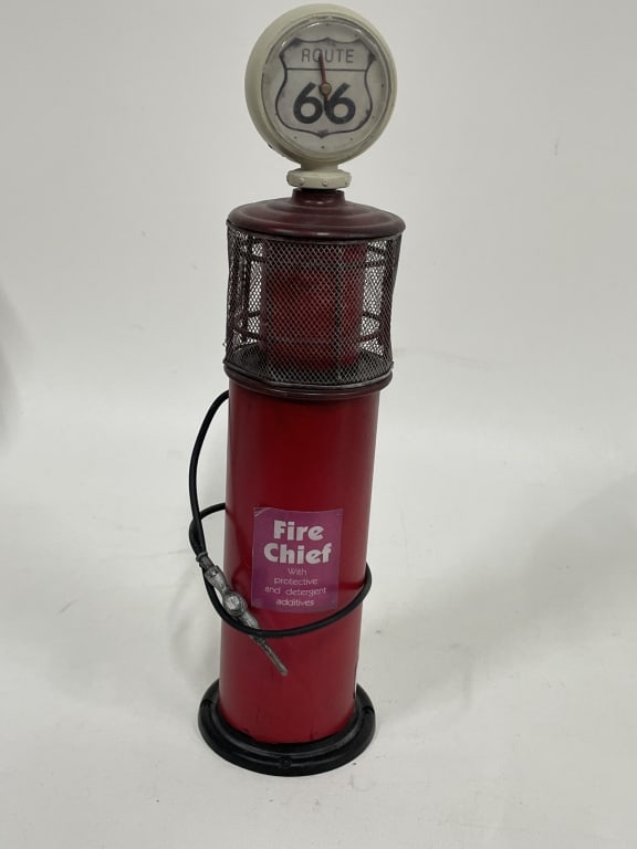 ROUTE 66 FIRE CHIEF GAS PUMP REPLICA 14": ROUTE 66 FIRE CHIEF GAS PUMP REPLICA – RETRO AUTOMOTIVE DECOR -Good pre owned condition -Approx 14"h -Vintage-inspired Route 66 Fire Chief Gas Pump Replica, crafted in bold red with classic American