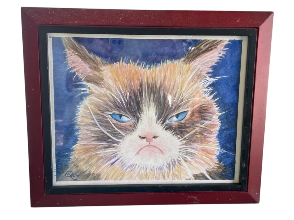 FRAMED CAT PORTRAIT SIGNED 12": FRAMED CAT PORTRAIT SIGNED 12" -Very good pre owned condition -Approx 12"l x 10.5"h -A whimsical and expressive original watercolor painting of a cat with striking blue eyes and a comically grumpy exp
