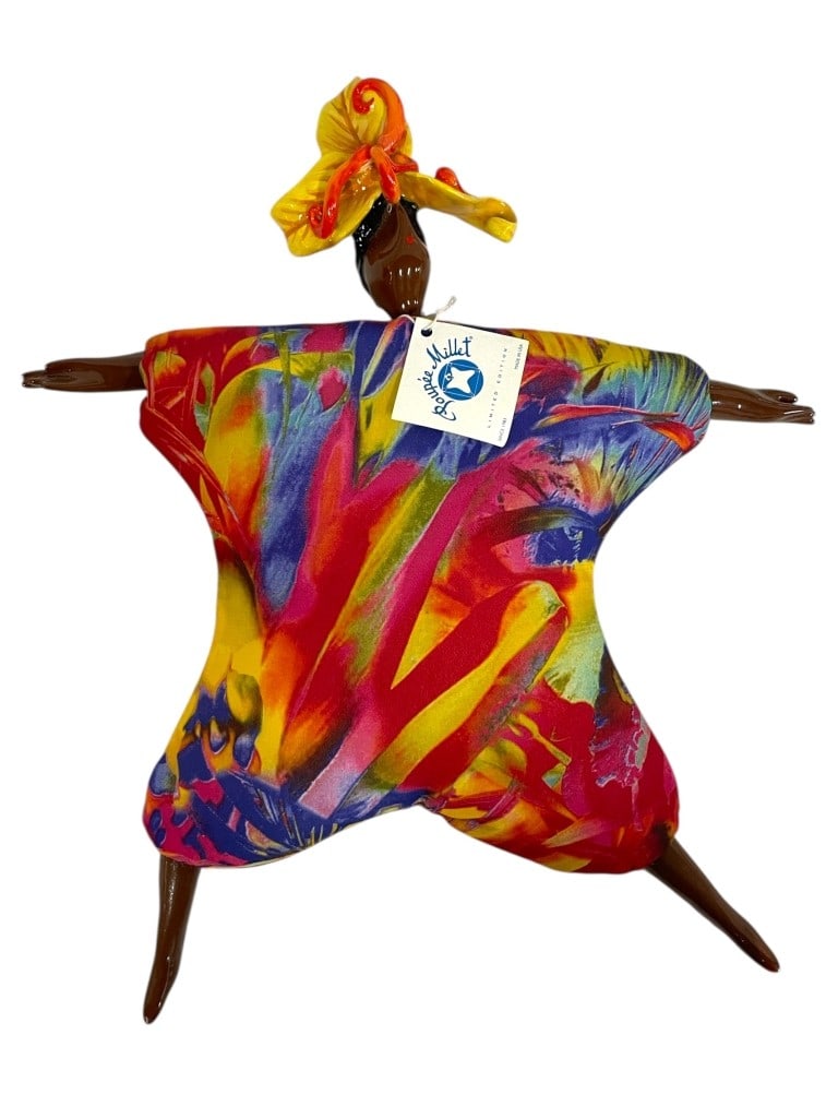 POUPEE MILLET LIMITED EDITION ART DOLL 10": POUPEE MILLET LIMITED EDITION ART DOLL 10" -Very good pre owned condition -Approx 10"h x 9"w -Featuring a vibrant Caribbean-inspired carnival dancer with outstretched arms and legs, dressed in a color