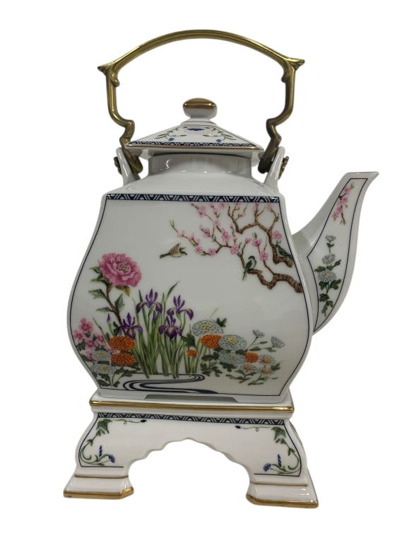 1986 JAPAN MADE PORCELAIN TEAPOT W. BRASS HANDLE: - beautiful design and artwork - great condition By bidding on this listing, you understand and agree to be bound by the terms and conditions of DejaVu Auctions. * For local pick up or third party shi