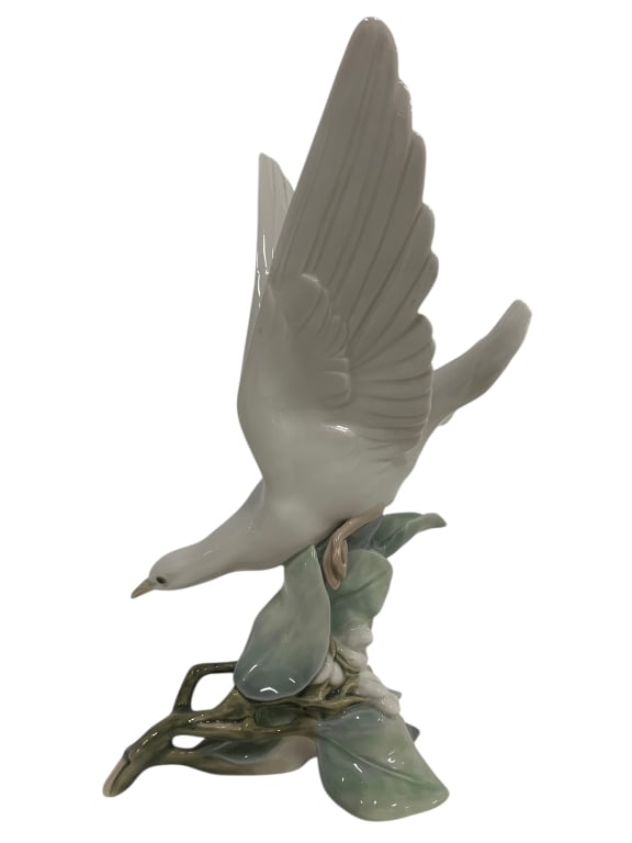 LLADRO WHITE LOVE DOVE LANDING ON BERRY BRANCH: - white doves represent love - a great gift for someone you love - wings spread as it lands - stamped numbered on bottom - great condition By bidding on this listing, you understand and agree to be bo