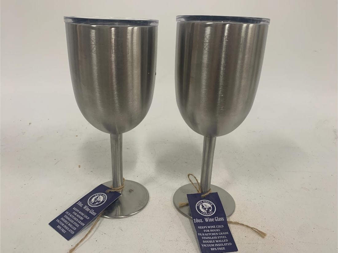 NEW STAINLESS STEEL LIDDED STEM WINE GLASSES X 2: - 2 FABULOUS wine glasses in stainless steel - comes with secure lid for easy handling - new with tags condition By bidding on this listing, you understand and agree to be bound by the terms and condi