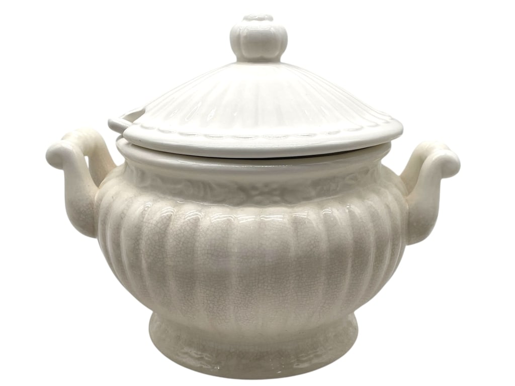 WHITE IRONSTONE SOUP TUREEN WITH LID 10": WHITE IRONSTONE SOUP TUREEN WITH LID 10" -Very good pre owned condition -Approx 9"h x 10"w -White ironstone soup tureen, featuring a classic ribbed body, elegant scrolled handles, and a matching domed