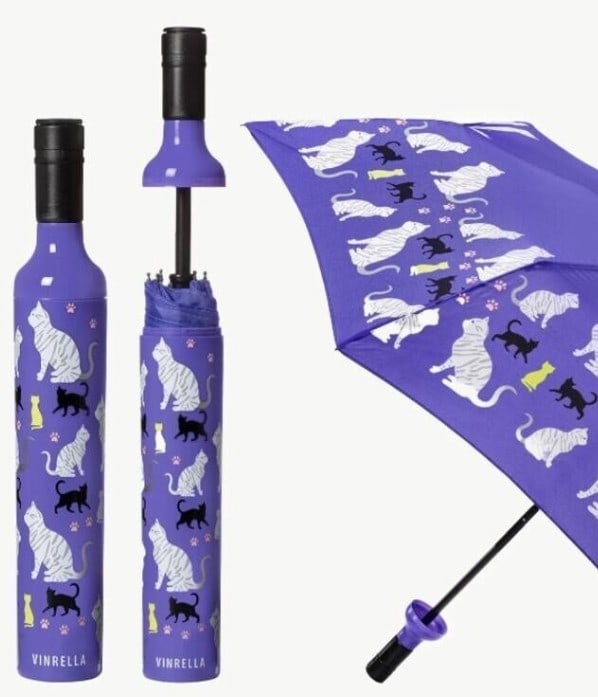 NEW! VINRELLA PURRFECTION BOTTLE UMBRELLA: NEW! VINRELLA PURRFECTION BOTTLE UMBRELLA Vinrella umbrellas have a no-drip design to seal your wet umbrella in the bottle and protect your purse, backpack or briefcase. Loop concealed in handle for c
